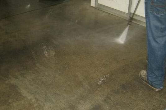 cleaning basement floor with bleach