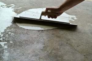 Repairing a pitted and spalled garage floor