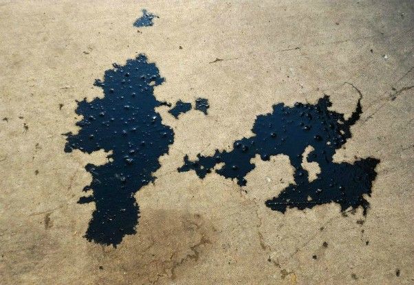 How To Keep Oil Stains off Concrete Garage Floors & Driveways